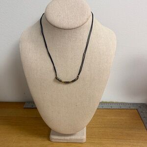 Gold tone tribal bar on black cord necklace dainty